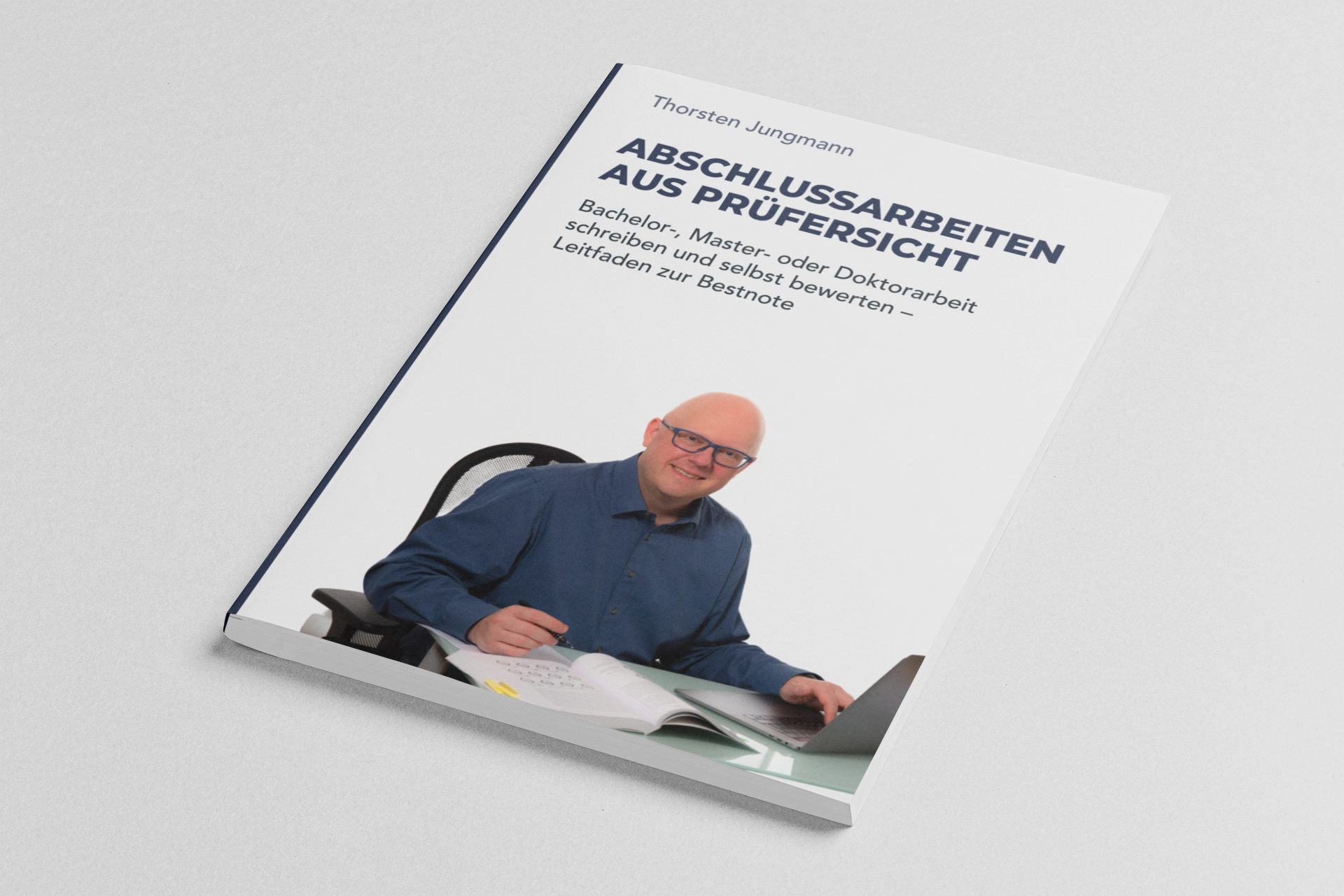 minimal-mockup-of-a-paperback-book-placed-on-a-customizable-surface-33651.png